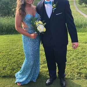Scala blue sequin prom dress with thin straps and strappy fun look